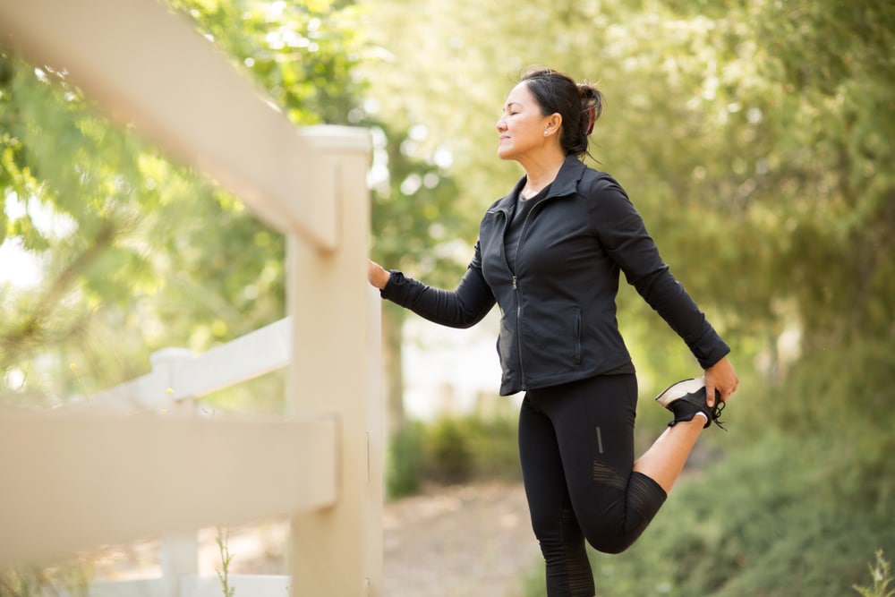 Portrait,Of,A,Fit,Asian,Woman,Exercising,Outside.