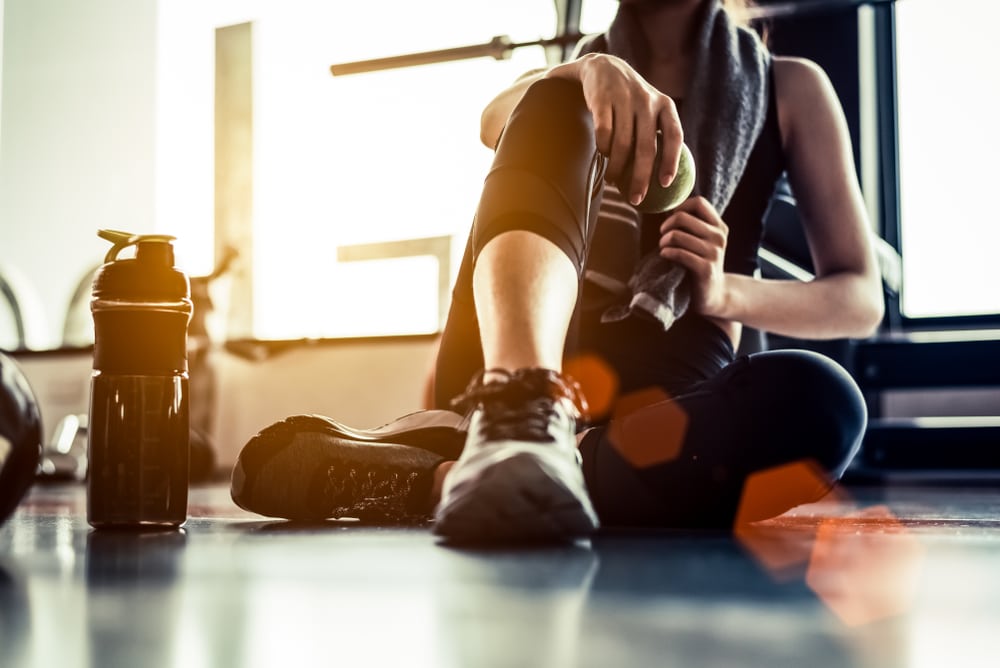 Sport,Woman,Sitting,And,Resting,After,Workout,Or,Exercise,In