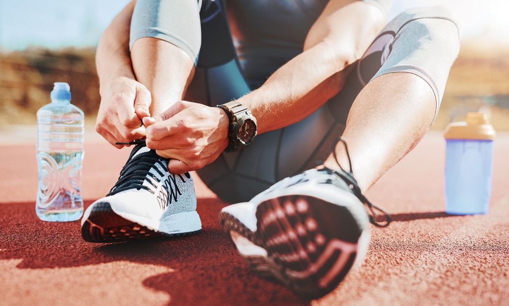 Tying,Sports,Shoe.,A,Young,Sportsman,Getting,Ready,For,Athletic